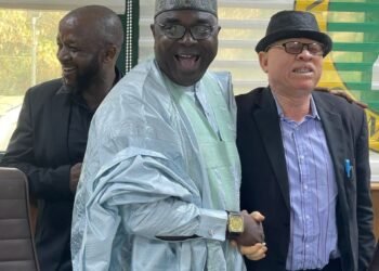 Adeyi Onah Daniel, Secretary of the National Population Commission (NPC) in a picture with Aminu Yusuf, the new Chairman of the NPC
