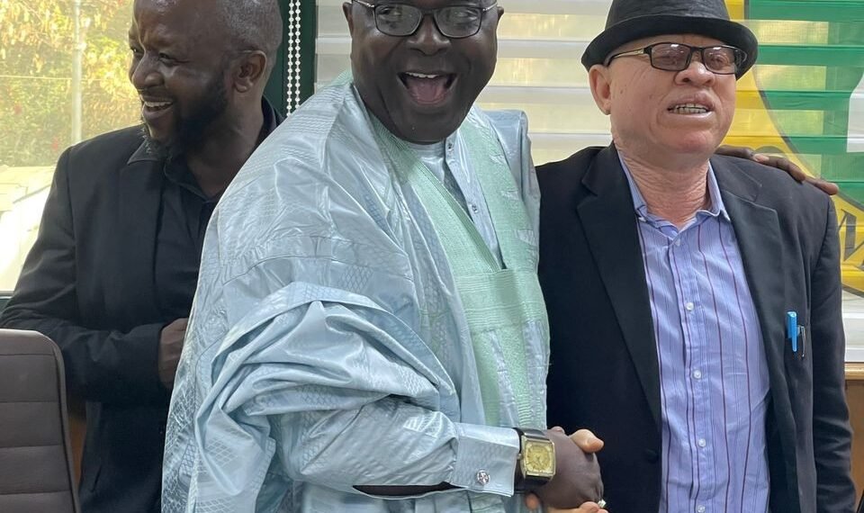 Adeyi Onah Daniel, Secretary of the National Population Commission (NPC) in a picture with Aminu Yusuf, the new Chairman of the NPC