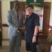 Picture of Dr. Paul Ogwuche and Adeyi Onah Daniel shaking hands